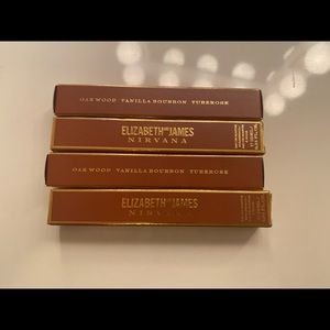 4 Elizabeth and James Nirvana bourbon rollerballs (as a set). Never opened/used.